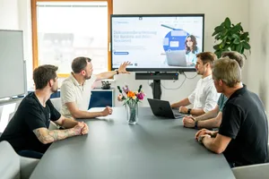Mitarbeiter in einem Meeting